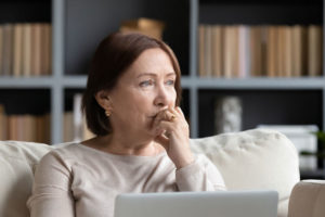 Dental Patient Wondering If She Should Get Dental Implants Or Dentures in Plymouth, MN